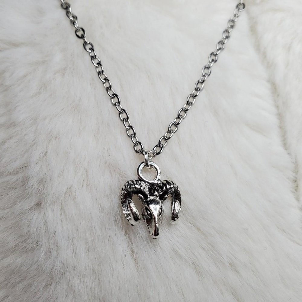 Tiny ram sheep necklace.